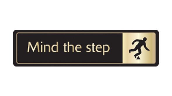 Mind the step with symbol. Gold on black. F/M