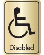 Disabled symbol with text. Black on gold. F/M