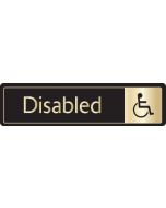 Disabled with symbol. Gold on black. F/M