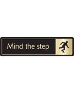 Mind the step with symbol. Gold on black. F/M